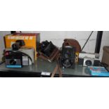Assorted cameras (4), inc. Polaroid Swinger II, Ensign Ful-Vue, Voigtlander and an Instamatic