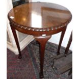Edwardian mahogany round occasional table on elongated cabriole legs with ball and claw feet