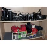 Good collection of assorted cameras and lenses, inc. Olympus, Praktika, Canon, Iloca and a Sony FD
