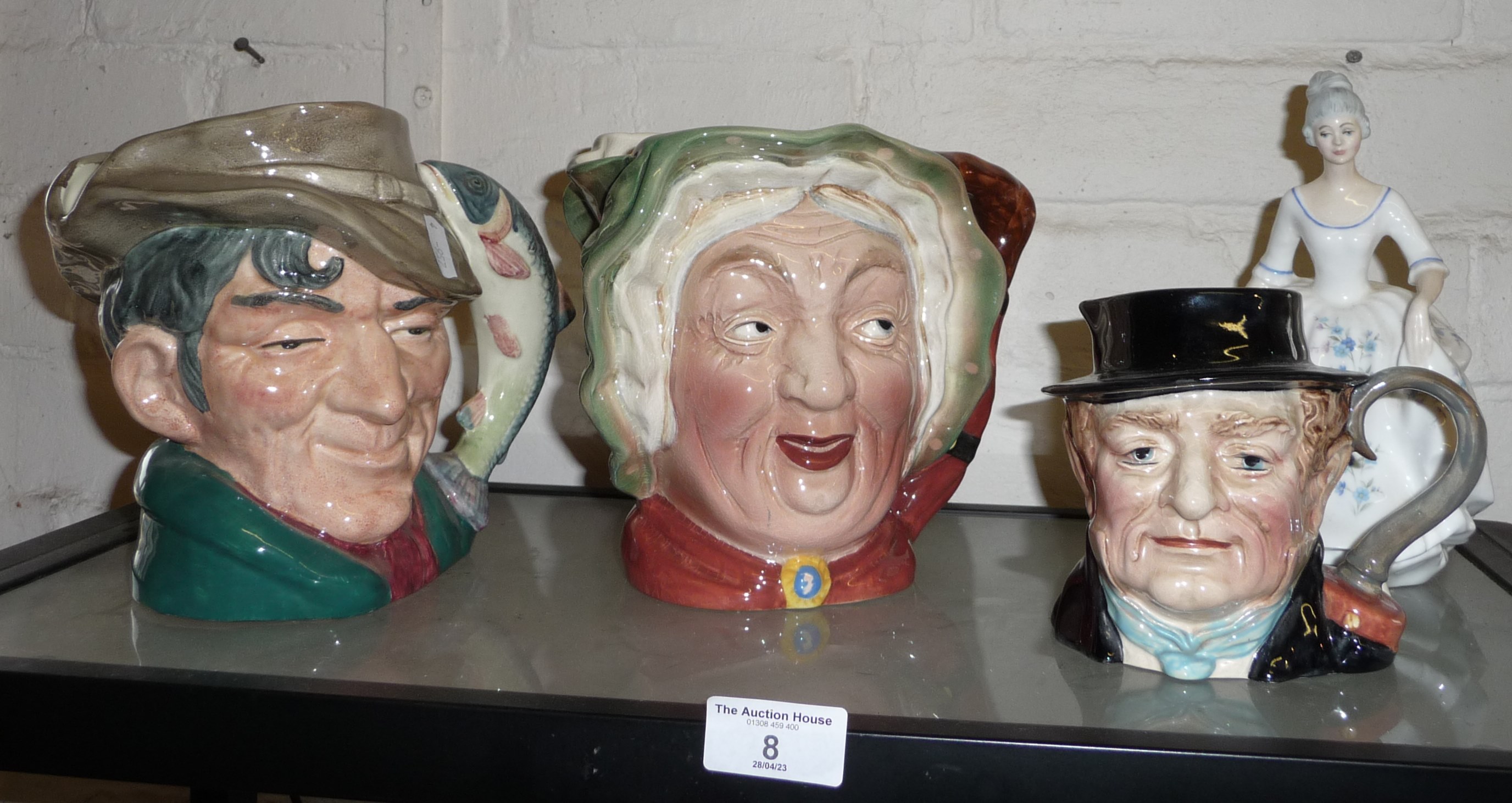 Royal Doulton character jug of "The Poacher", a Royal Doulton figure of Caroline and two Beswick