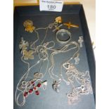 Silver necklaces, yellow metal crucifix, silver ring, religious medallions and other jewellery