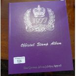 Stamp album of the Queen's 1977 Silver Jubilee Appeal