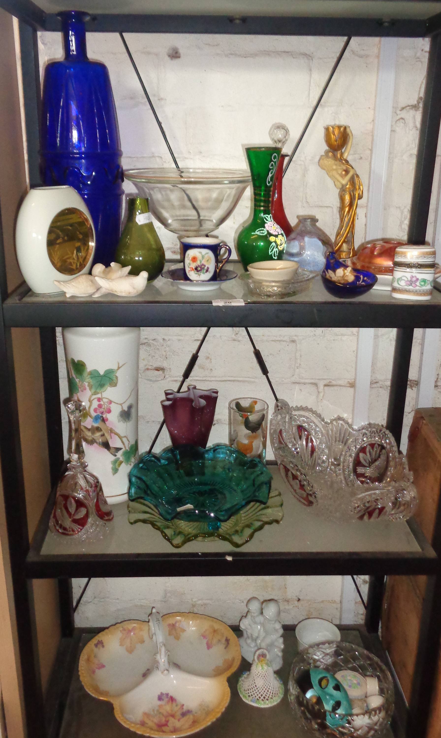 Collection of china and glassware on three shelves