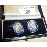 Russian silver and blue enamel cufflinks each set with four green stones and decorated with profiles