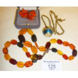 Amber bead necklace with silver clasp, Buler enamelled ball pendant watch and some coral clip on