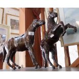 Pair of unusual varnished leather papier mache scale models of horses