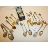 Good collection of souvenir and other spoons, inc. a hallmarked silver napkin ring in case. Many