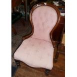 Victorian mahogany balloon back nursing chair with upholstered seat and back on turned legs