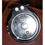 A "Steelite" bakelite fishing reel