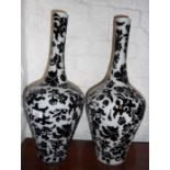 Pair of contemporary black and white cameo cut glass vases, approx. 51cm high