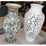 Chinese porcelain Famille Vert vase with a blanc de chine vase (both drilled as lamp bases)