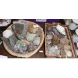 Two baskets of geodes, rocks and fossils