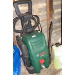 A Bosch pressure washer and liquid