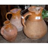 Three Verwood pottery jugs and pitchers