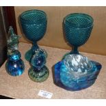 Two Mdina glass sea horse paperweights, pair of blue glass goblets and another glass item
