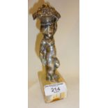 Silver plated figure of a putto holding a basket, on an onyx base