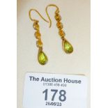 Antique rose gold drop earrings with green stone
