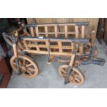 Early 20th c. Eastern European dog or goat cart, makers label