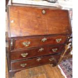 Georgian mahogany bureau on bracket feet