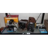 Assorted cameras (4), inc. Polaroid Swinger II, Ensign Ful-Vue, Voigtlander and an Instamatic
