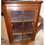 Glazed antique oak corner cabinet