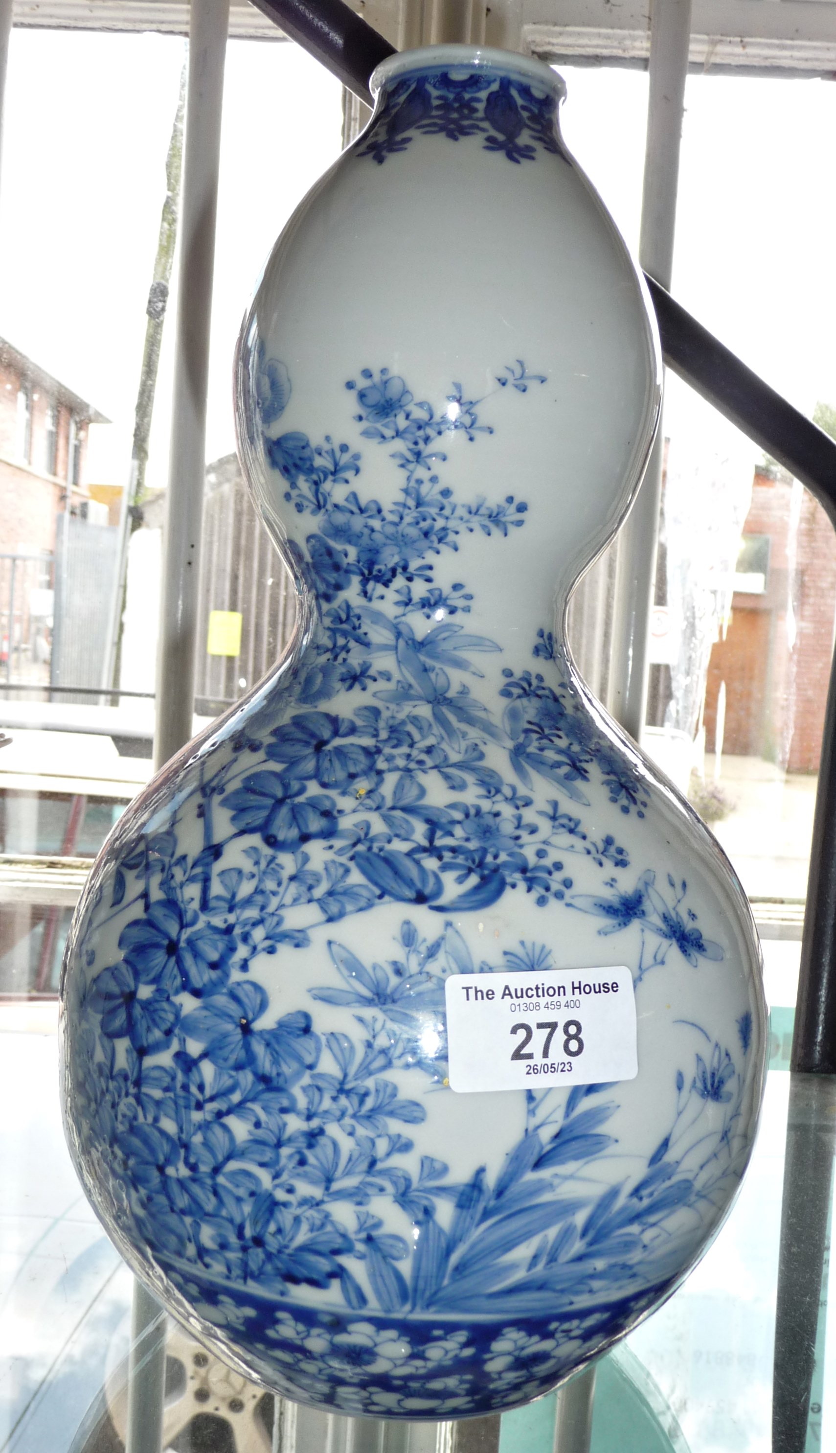 Oriental blue and white double gourd vase, 30cms high