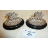 Pair of silver menu or place card holders in the form of Welsh dragons. Approx. 8cm length of base