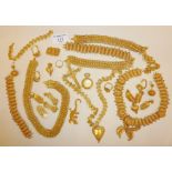 Quantity of continental yellow metal jewellery, inc. earrings, necklaces, bracelets, etc.