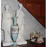 Two plaster statues, Continental porcelain chess playing group and a painted glass vase