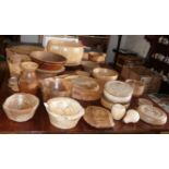 Large collection of turned wood bowls and dishes