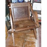 Arts & Crafts oak Monk's chair with carved Latin lettering (later pegs)