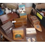 Group of assorted wooden cigarette boxes (7) inc. a marquetry revolving musical model of a