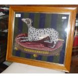 Woolwork picture of a dalmatian on a cushion in maple frame