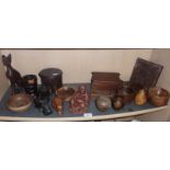 Assorted turned wood items and figures, inc. lignum vitae mortar, a seated buddha, etc.