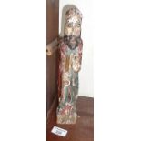 Antique painted limewood carving of a religious figure