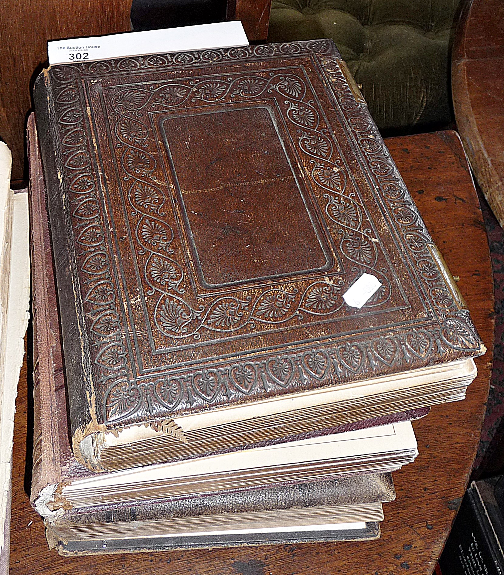 Three Victorian photograph albums of cartes des visites and cabinet cards