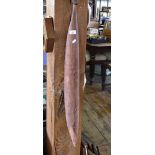 Tribal Art: Australian aboriginal woomera in red ochre and having gum handle, 3ft long