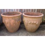 Pair of large round terracotta planters