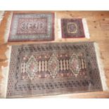 Three Persian prayer rugs