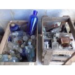 Two wooden crates of assorted bottles, inc. chemist's medicine bottles, etc.