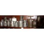 Large collection of old pewter tankards, jugs, teapots, etc., and a tongue press