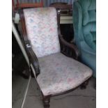 Victorian armchair with wooden arms and legs