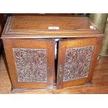 Victorian carved oak smoker's cabinet