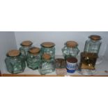 Seven glass storage jars, a Moss Pentewan pottery storage jar and other items