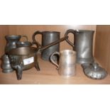 19th c. bronze skillet on tripod feet and marked "pint" to handle, seven various pewter tankards and