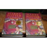 Two 1997 Harry Potter and The Philosopher's Stone paperback, both with "Text Joanne Rowling" instead