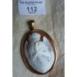 Antique large shell cameo pendant with finely carved angel holding a dove, in gold frame. Approx