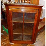 Corner cupboard with glazed door