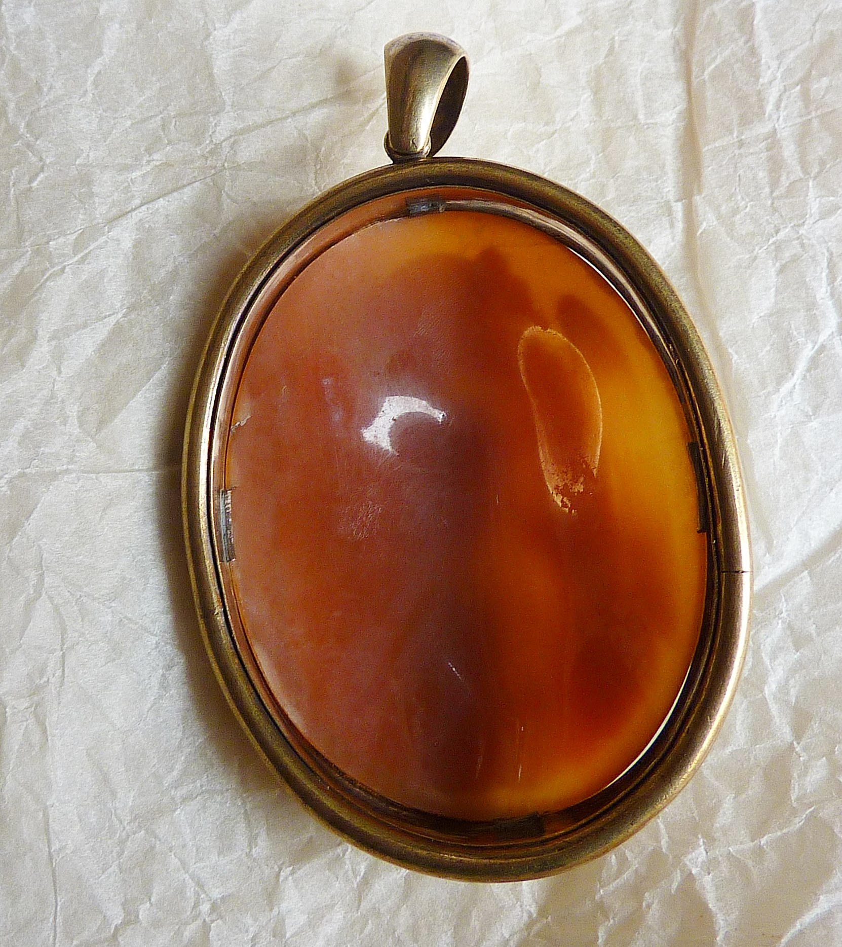 Antique large shell cameo pendant with finely carved angel holding a dove, in gold frame. Approx - Image 2 of 2