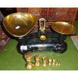 Iron and brass kitchen scales with brass bell weights
